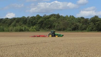 Tractor ploughing the arable field on South Down